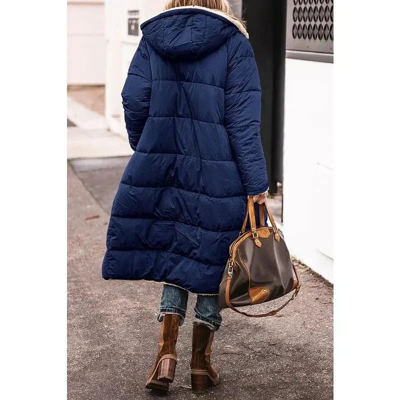 Elegant jade-colored winter coat — chic and timeless